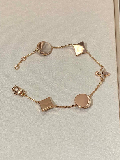 [AuraEcho]STAR AND SUN 5 MOTIF MOP PINK GOLD BRACELET
